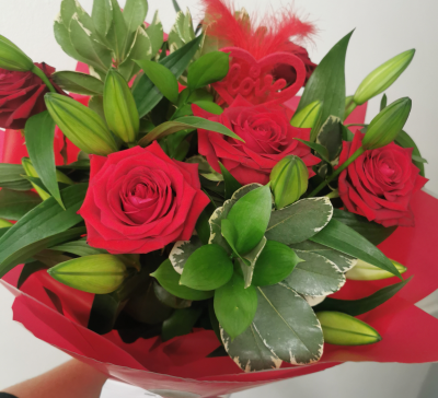 Rose and Lily Love ❤️ Bouquet - A mix of red rose and Lillie's with a mix of foliage and love heart pick, gift wrapped.
If you would like the roses to be pink or white, please state in special instructions