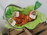 Chocolate egg carrot cone - A selection of mini eggs and small eggs in a carrot sweet cone tied with a small happy easter plaque